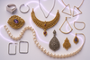 MODERN AND TRADITIONAL JEWELLERIES IN A WHITE AND LIGH PURPLE NEON LIGHTED BACKGROUND